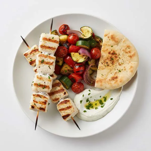 Grilled Fish Shish Kebab With Charred Vegetables, Pita And Citrus Tahini Mayo